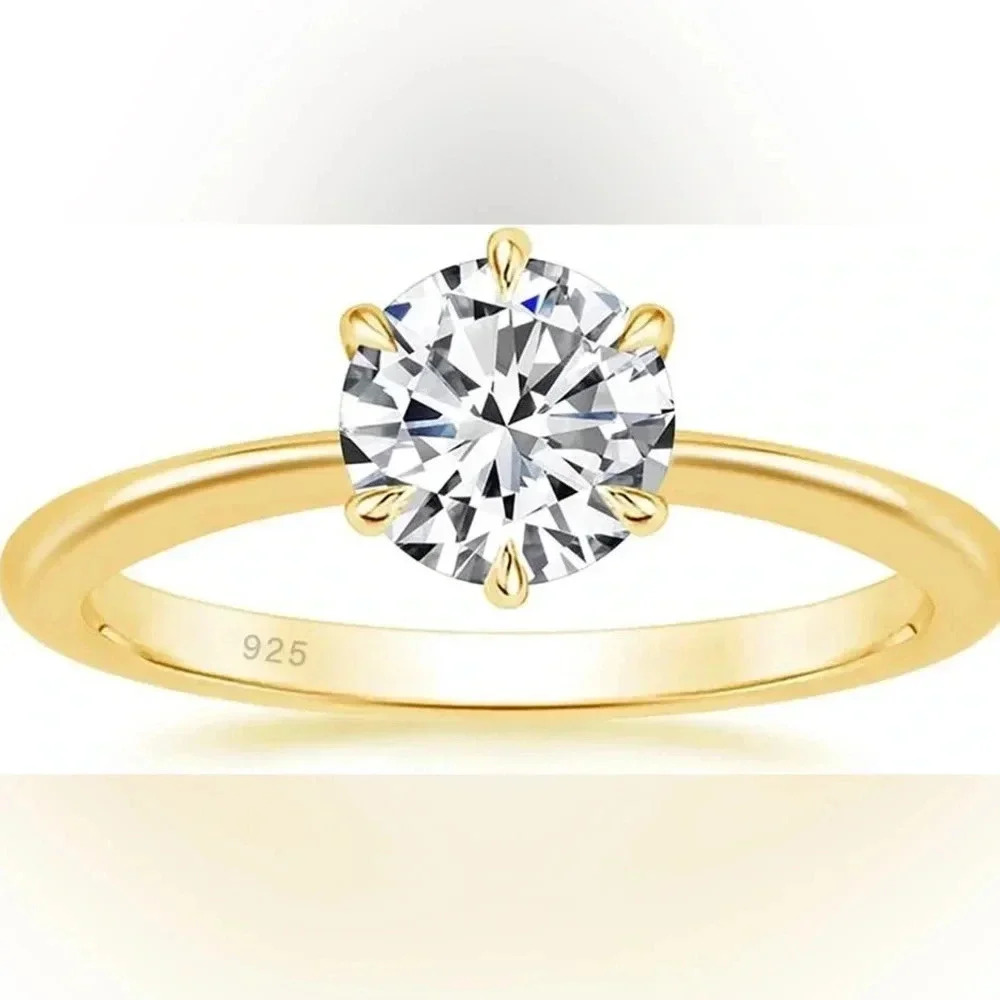4 Cubic Zirconia Engagement Rings & 1 Wedding Band